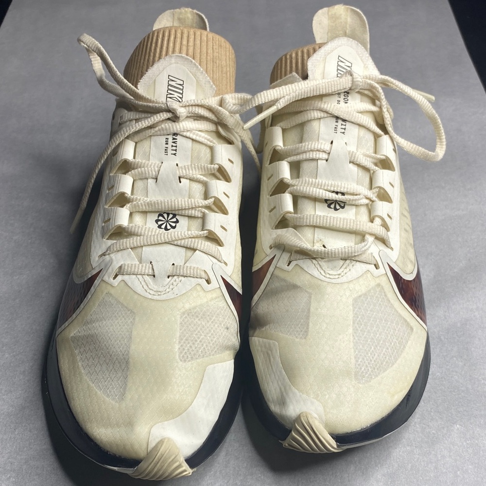 Nike zoom Gravity Cream and Brown Athletic Shoes